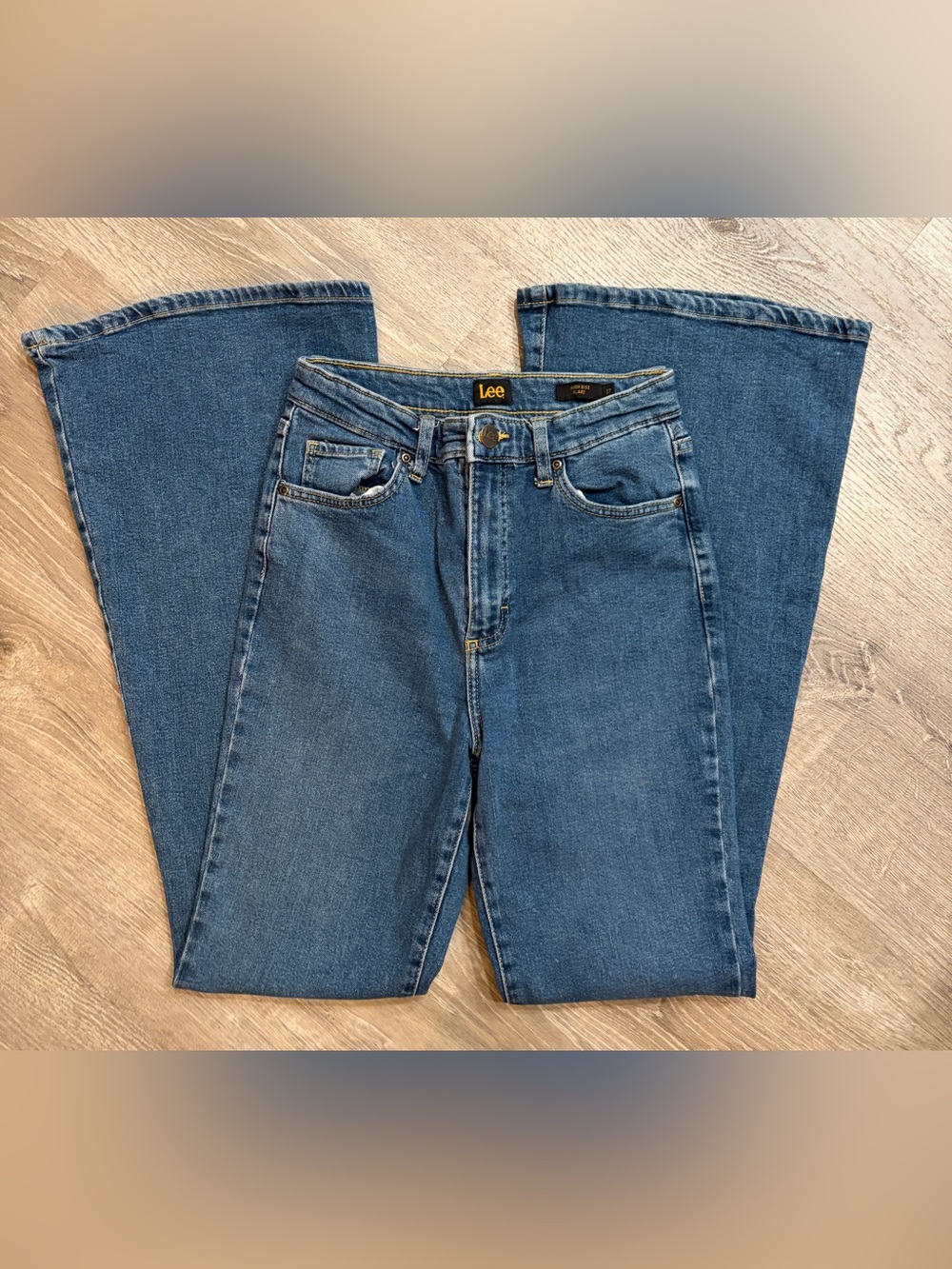 Lee Women's high rise flare Size 27 Medium Wash